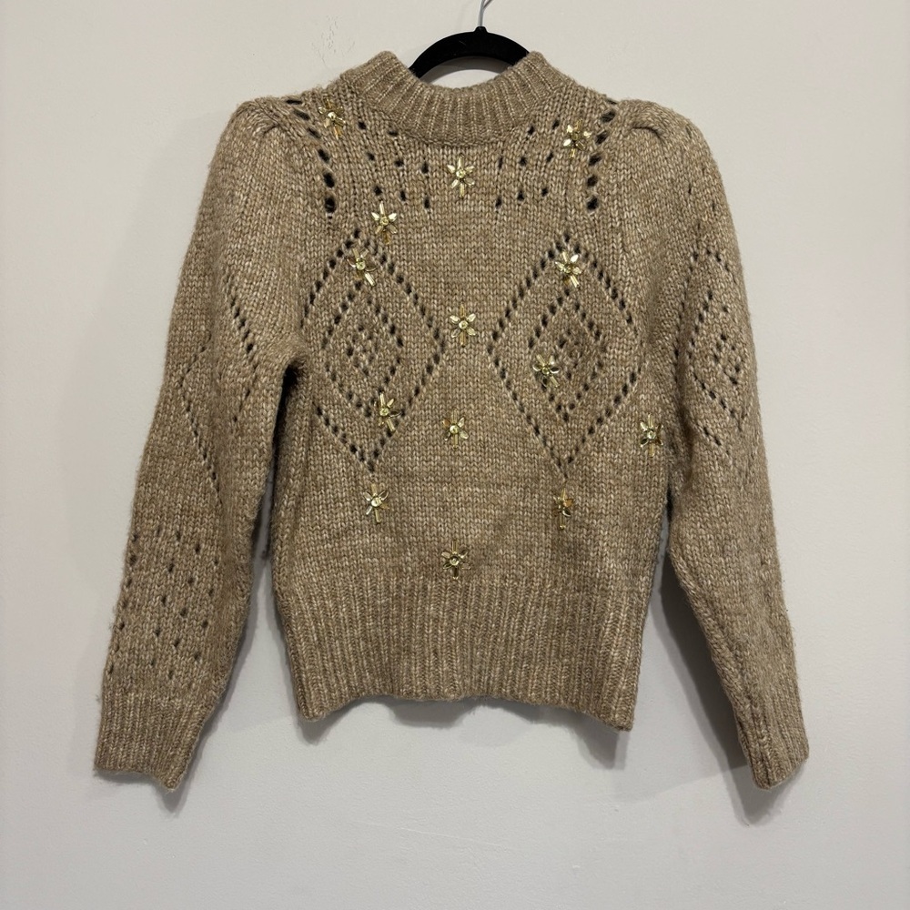Beige sweater with sparkly flowers and poofy shoulders